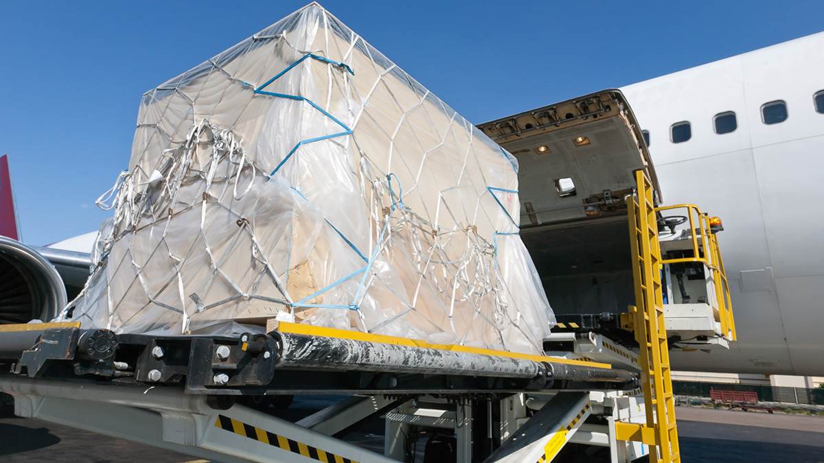 Heavy and oversized cargo being loaded onto a plane